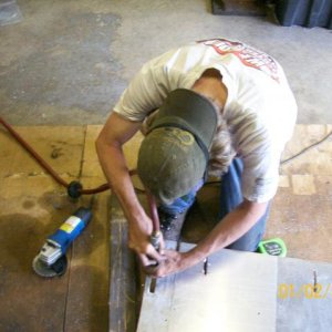 Grinding edges of new hole.jpg